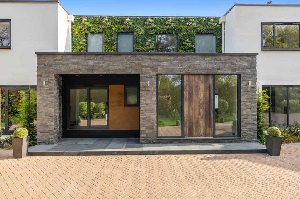 A big house with a lot of windows and doors