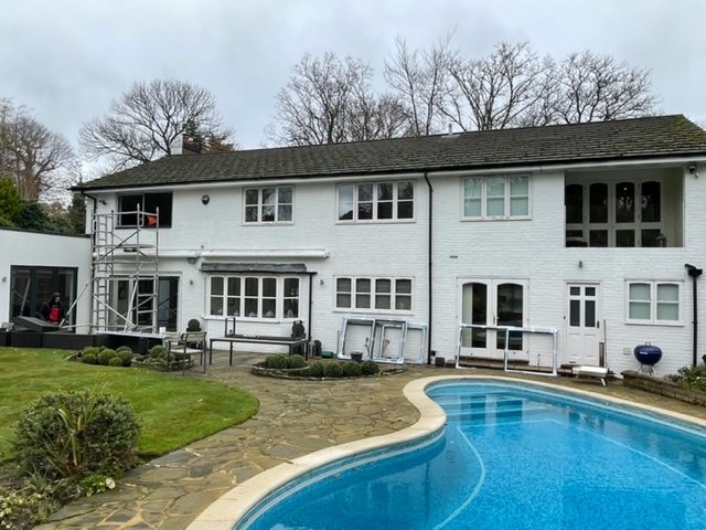 A big house with a lot of windows and doors